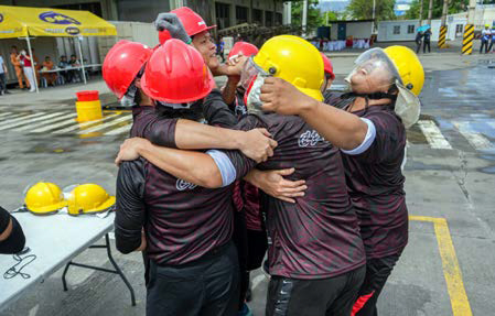 group of people hugging each other